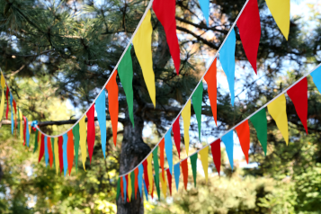 Colourful bunting hanging up in a park